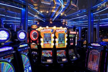 Jurassic Kingdom slot game interface showing reels and dinosaur theme graphics
